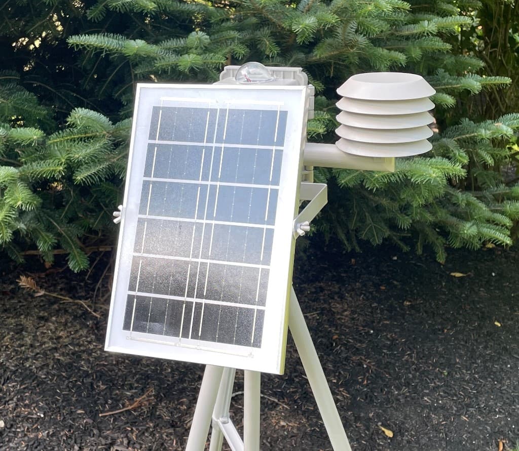 Sample Omnisond station with solar panel and radiation shield at a Massachusetts field site